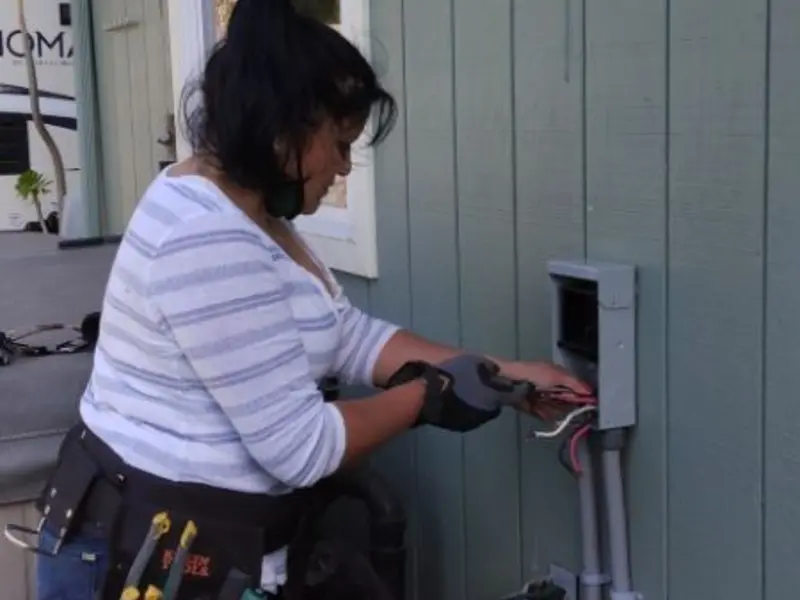 Licensed electrician wiring an exterior subpanel in Marin City